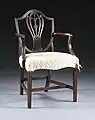 Mahogany elbow chair in the Hepplewhite style, made circa 1790