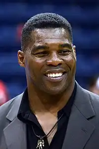 A picture of Herschel Walker posing.