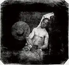 Hippolyte Bayard poses as a drowned man. He lies with his eyes closed, both for the technical reason of the long exposure required by his method and as a protest for the rejection of his claim as inventor of photography.