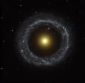 The yellow nucleus of Hoag's Object surrounded by a blue ring of stars