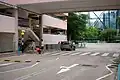 A zebra crossing outfitted with Belisha beacons in Hong Kong