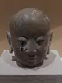 Statue head of a Buddhist arhat, Western Xia dynasty, from Hongfo Pagoda, Helan County, Ningxia