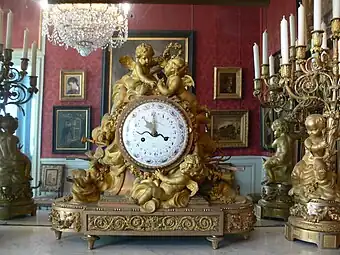 Gilt-bronze mantel clock, dial signed Ferdinand Berthoud (Château de Compiègne).