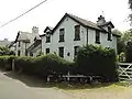 The three Woodbank Hall cottages on Shotwick Lane