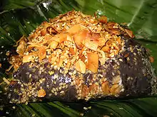 Htamanè - glutinous rice with fried coconut, roasted peanuts, sesame and ginger