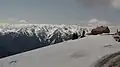 The visitors center at Hurricane Ridge, The Bailey Range beyond.