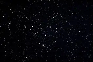 The Hyades is a naked-eye open cluster in the constellation of Taurus. Aldebaran is bright star in bottom-middle. The "V" of Taurus is pointing to the top-right corner.