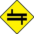 W 021LStaggered Crossroads Ahead at Dual C'way - Left