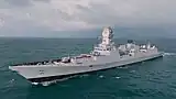 Imphal, the third ship of the class, on sea trials.