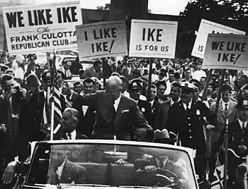 Eisenhower sitting on a car, campaigning in Baltimore, September 1952