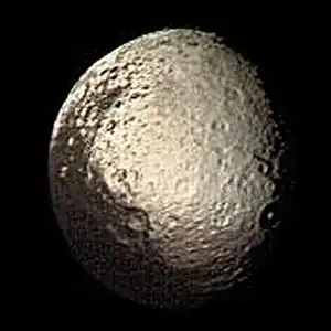 Enhanced version of an image of Iapetus by Voyager 2. The left side of Iapetus in this image is its side that is always facing away from Saturn.