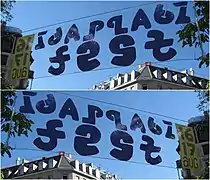 A practical application of mirror ambigrams in a banner reading "Idaplatz fest" front and back (Zürich, 2008).