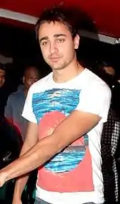 Young man in a multicolored T-shirt