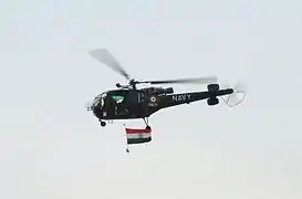 Helicopter flying the Indian flag