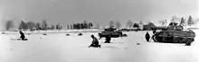 44th Armored Infantry soldiers and 6th Armored Division tanks near Bastogne, 31 December 1944