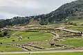 Llamas grazing in the Ingapirca ruins in Ecuador.