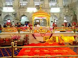 View of the front of the Darbar Sahib or Prayer Hall showing the Palki housing the Guru Granth Sahibji