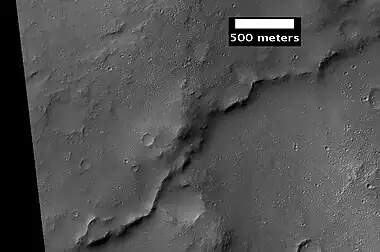 Example of inverted terrain in Parana Valles region, as seen by HiRISE under the HiWish program. Illumination is from the NW.