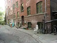 street scene with brick multi-story building