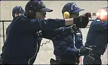 Shooting drills with revolvers.