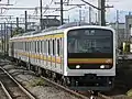 A Nambu Line 6-car 209-0 series train in January 2008