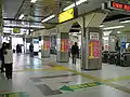 Ticket gates at the south and west exits