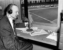 Jack Brickhouse in the press box getting ready to announce a Chicago White Sox game for WGN TV at Comiskey Park, in 1948