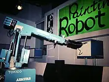 Robotic arm painting a picture.