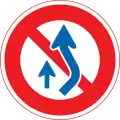 No crossing center line to overtake. 追越し禁止 sign below = NO passing at all