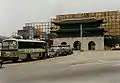 The colonial building is demolished behind a decorative screen in 1996.