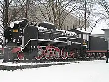 This Japanese D51 steam locomotive stands outside the Yuzhno-Sakhalinsk Railway Station