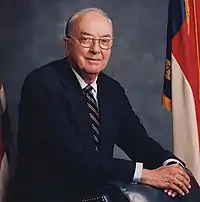 A photograph of a man wearing formal attire