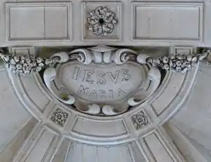 Keystone from the early church, with Oratory motto "Jesus and Mary"