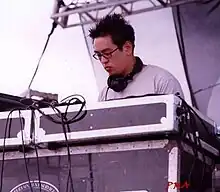 Photograph of Joe Hahn man looking down.