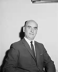 Black and white portrait of man in suit