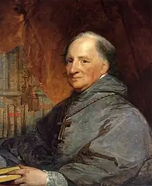 A painting of an elderly man seated wearing a long gray robe.