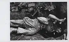 A Marine Tunnel Rat crawls into a captured North Vietnamese bunker