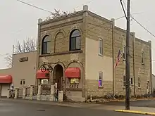 Modest Victorian brick building housing a cafe"