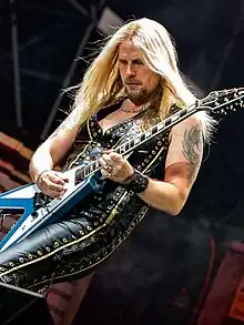 Faulkner performing with Judas Priest in 2022