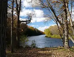 The river the town is named for, viewed from the wayside on Highway 73.