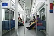 Interior of the KTM Class 92 EMU, end coaches feature longitudinal seating.