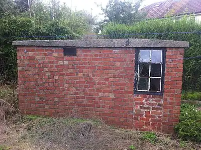 WW2 air raid shelter behind No. 83 Coombe Dale.  Photo credit: Know Your Place web site