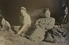 Jacques Raverat, Ka Cox, Gwen Raverat, Frances Cornford, as Neo-pagans, seated in a barn in Norfolk in 1912