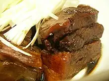 Kakuni is a Japanese braised pork dish which literally means "square simmered".