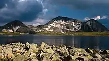 A glacial lake and a mountain summit