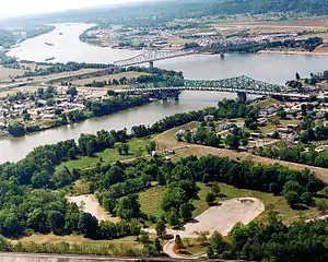 Point Pleasant (foreground) at the confluence of the Kanawha and Ohio Rivers. Gallipolis, Ohio is in the background right while Henderson, West Virginia is on the left.