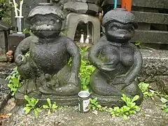 A paired male and female kappa statues at the Sogenji Buddhist shrine at the Asakusa district in Tokyo.