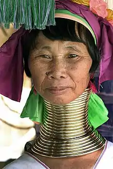 The Kayan people of Burma (Myanmar) associate the wearing of neck rings with feminine beauty.