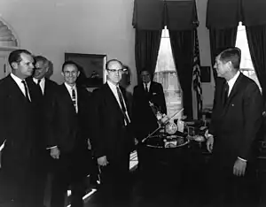 Pickering and Kennedy with a model of the Mariner 2 spacecraft