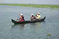 The locals using a boat for fishing and ferry service